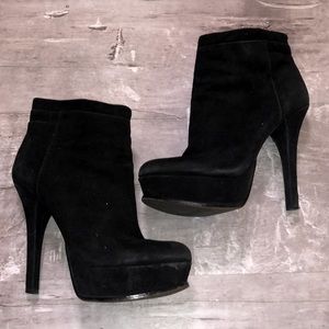 Pre loved 4 inch heeled booties. Surprisingly comfy and easy to walk in.